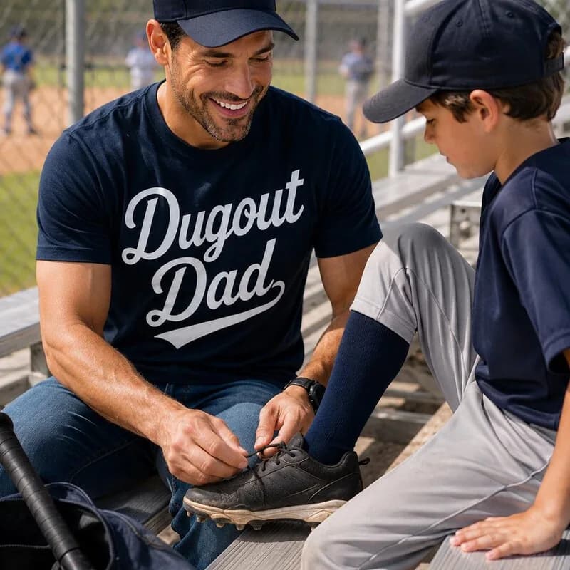 Navy Dugout Dad script shirt shown in the Etsy listing lifestyle photo